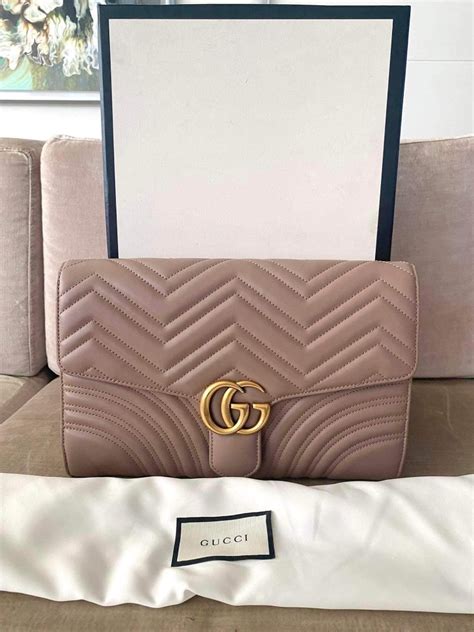 europian limited edition gucci wrist bag|Gucci marmont clutch bag.